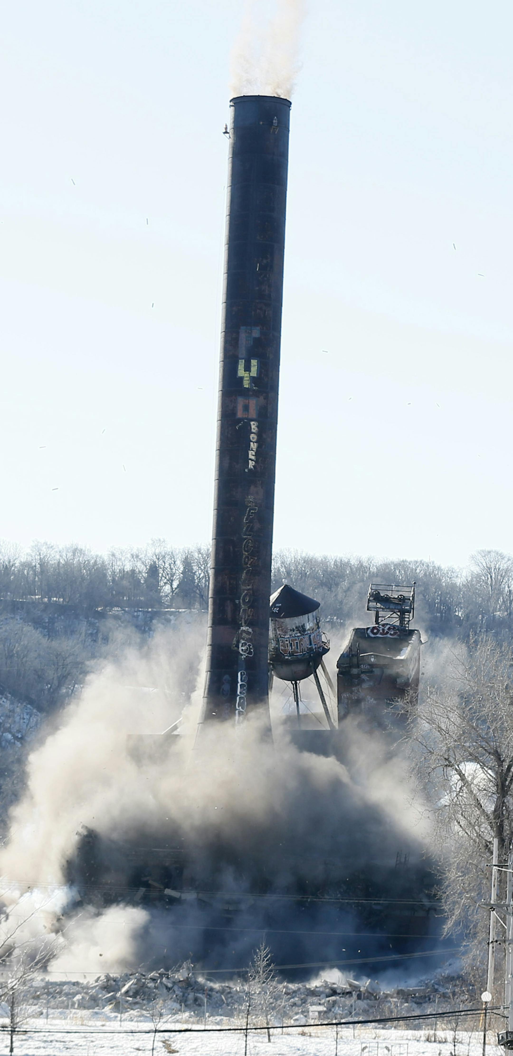 A St. Paul landmark was brought down with a blast on Sunday morning March 16, 2014. A coal-fired power plant on the Mississippi River, upstream from downtown St. Paul. The 10-story building was topped by a 180-foot smokestack. The blast was at 10 a.m. Sunday. in St. Paul, MN. ] JERRY HOLT jerry.holt@startribune.com
