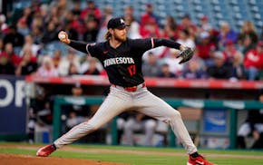 Twins starting pitcher Bailey Ober delivers to home plate during the first inning Friday in Anaheim.