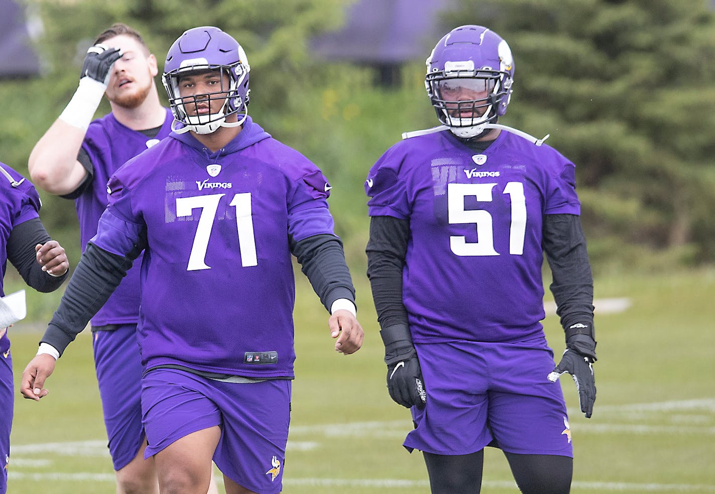 Vikings rookies, including defensemen Christian Darrisaw (71), left, and Wyatt Davis (51), practiced at TCO Performance Center, Friday, May 14, 2021 in Eagan, MN. ] ELIZABETH FLORES • liz.flores@startribune.com