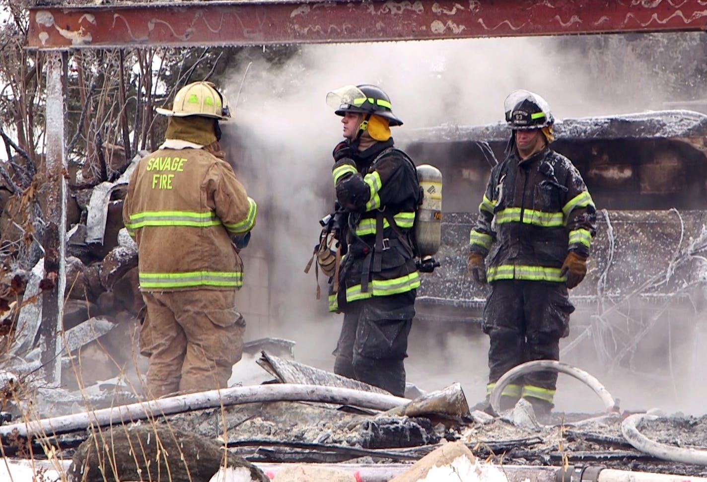 Authorities examine what's left of the restaurant at the clubhouse of the Minnesota Horse and Hunt Club in Prior Lake after fire erupted before dawn Tuesday.