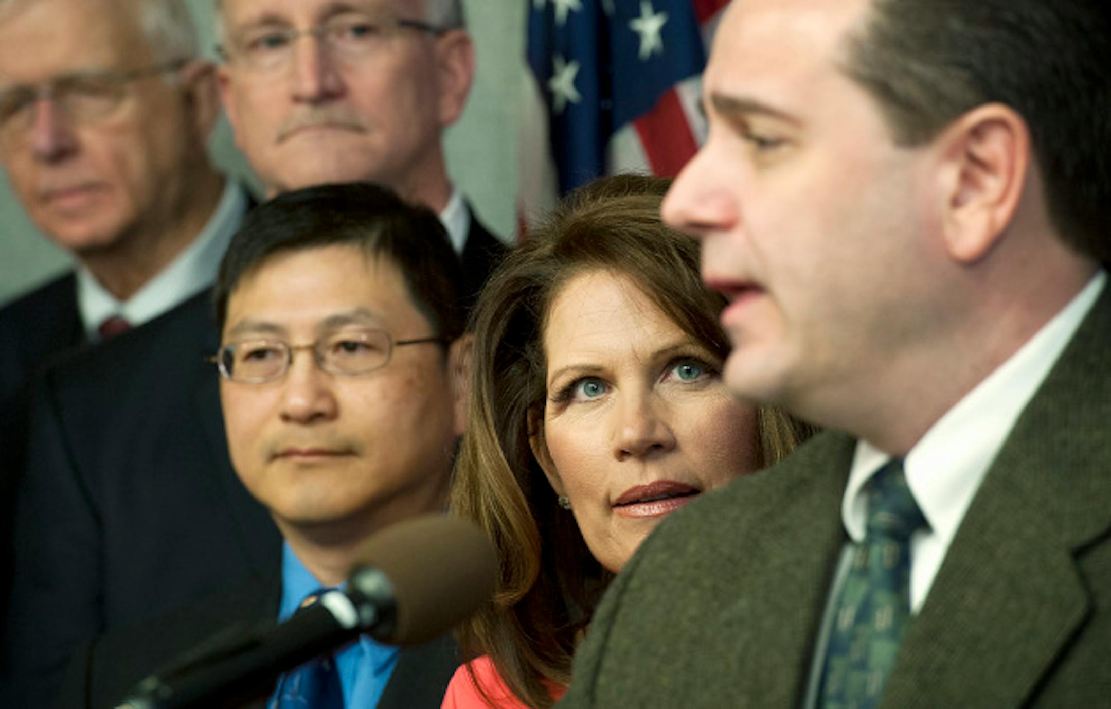 Surrounded by doctors and patients, Congresswoman Michele Bachmann and State Senator Sean Nienow (R-Cambridge) held a joint news conference to discuss problems with Medicaid reimbursement rates paid to doctors in Minnesota.  Both are introducing legislation increasing accountability and transparency.  When the questioning turned to Rep. Bachmann's ethics problems from her 2012 presidential campaign, aides closed in blocking reporters and photographers and ushered her out of the room.    Tuesday, April 9, 2013  ]   GLEN STUBBE * gstubbe@startribune.com