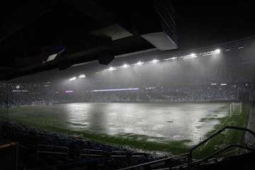 Allianz Field flooded during a storm on Wednesday. The game, tied 1-1 in the 18th minute, was suspended until Thursday.