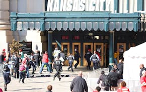 Law enforcement and medical personnel respond to a shooting at Union Station during the Kansas City Chiefs Super Bowl LVIII victory parade on Feb. 14,