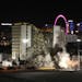 The Clarion hotel and casino is imploded, early Tuesday, Feb. 10, 2015, in Las Vegas. The 200-room casino-hotel opened in 1970 as the Royal Inn and wa