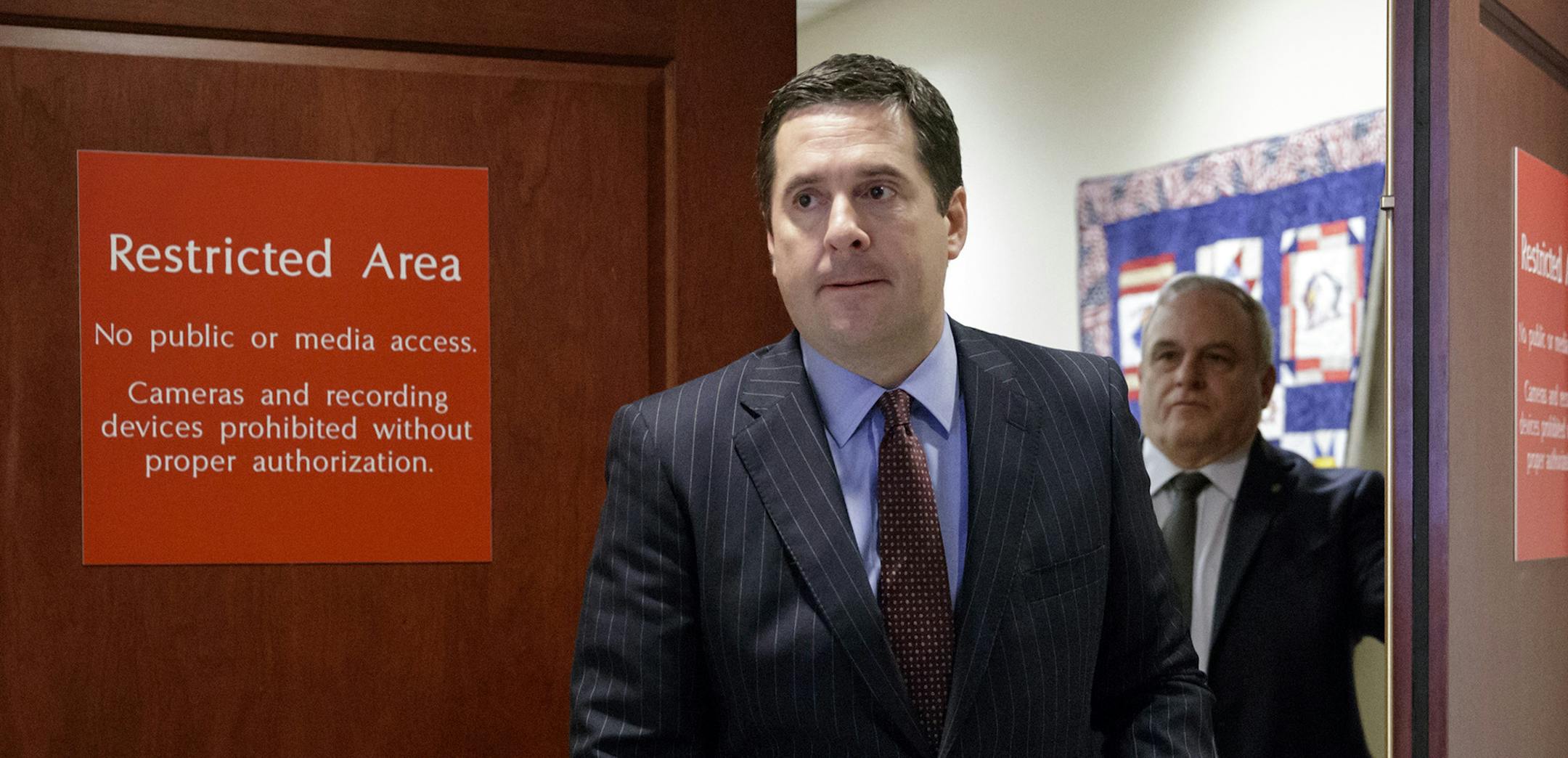 House Intelligence Committee Chairman Rep. Devin Nunes, R-Calif. arrives to give reporters an update about the ongoing Russia investigation, Wednesday, March 22, 2017, on Capitol Hill in Washington. Nines said President Donald Trump's communications may have been "monitored" during the transition period as part of an "incidental collection." (AP Photo/J. Scott Applewhite) ORG XMIT: MIN2017032318314907