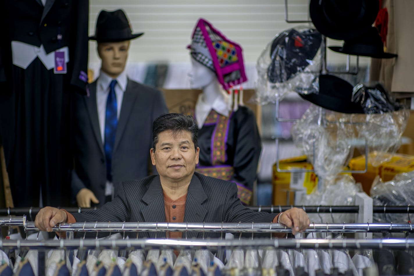 Long Her, a Hmong refugee, voted for Hillary Clinton in 2016, but now he's considering voting for Trump after his business was devastated by riots and he had a chance to speak at a "Cops for Trump" event last week. Here, Her is photographed at his store "New Fashions Tailoring & Alterations," Monday, September 28, 2020 in St. Paul, MN. ] ELIZABETH FLORES • liz.flores@startribune.com