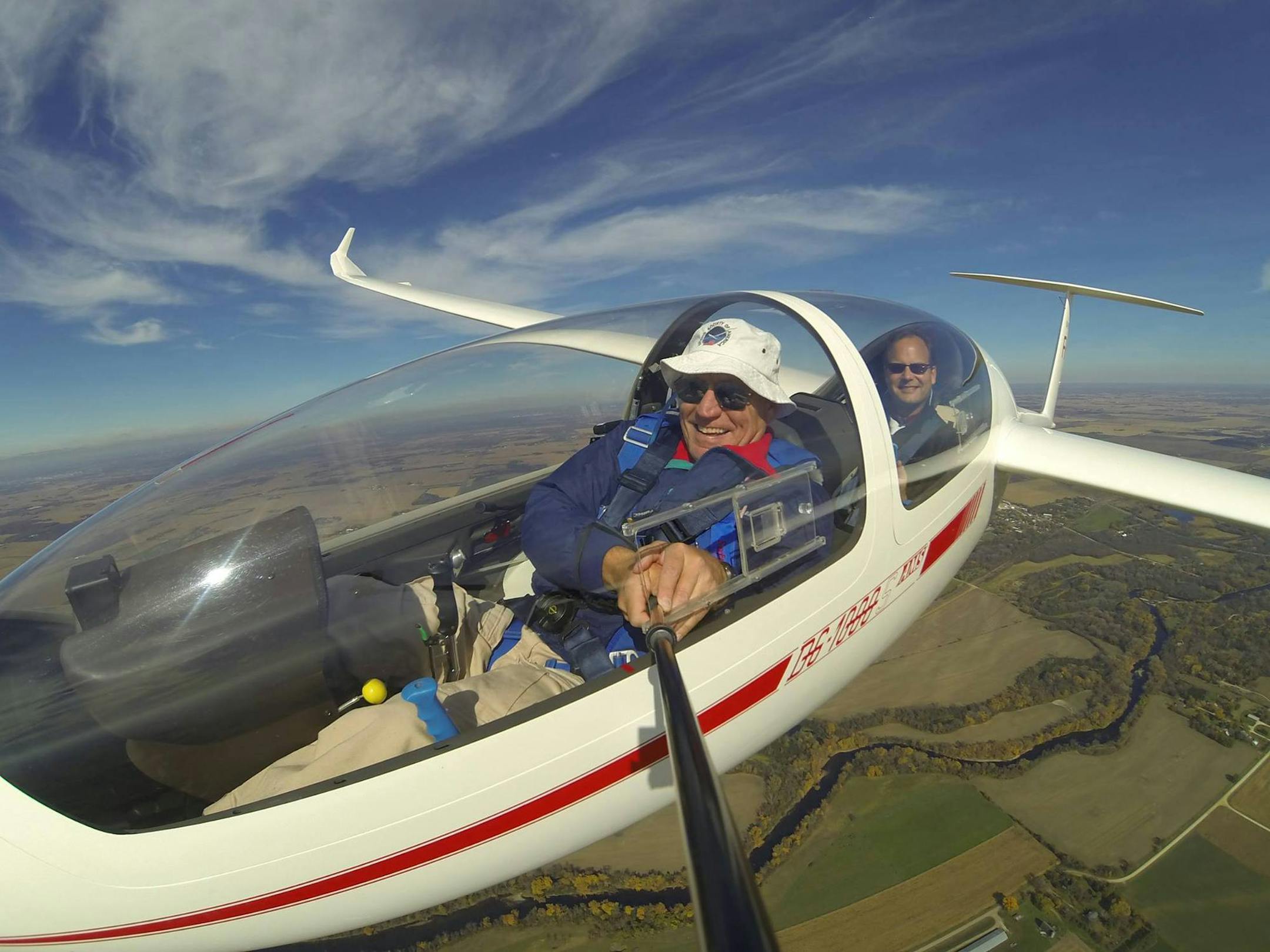 Lou Chouinard, left, in a glider with a friend and fellow glider pilot Paul Remde. ORG XMIT: o3vmmDBA3kHUHXq-KxOW
