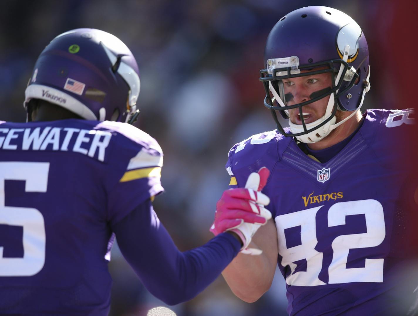 Vikings quarterback Teddy Bridgewater (5) congratulated Vikings tight end Kyle Rudolph (82) after they combined for a touchdown in the second quarter Sunday afternoon.