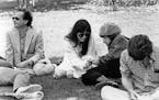 Bob Dylan with his ex-wife, Sara, and brother, David Zimmerman, on the lawn at Macalester College in 1983. The Dylans' daughter Maria was graduating a