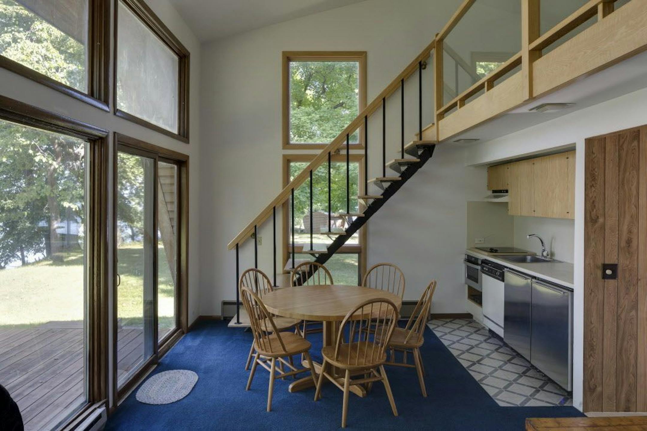 The guest cottage has a lofted space.