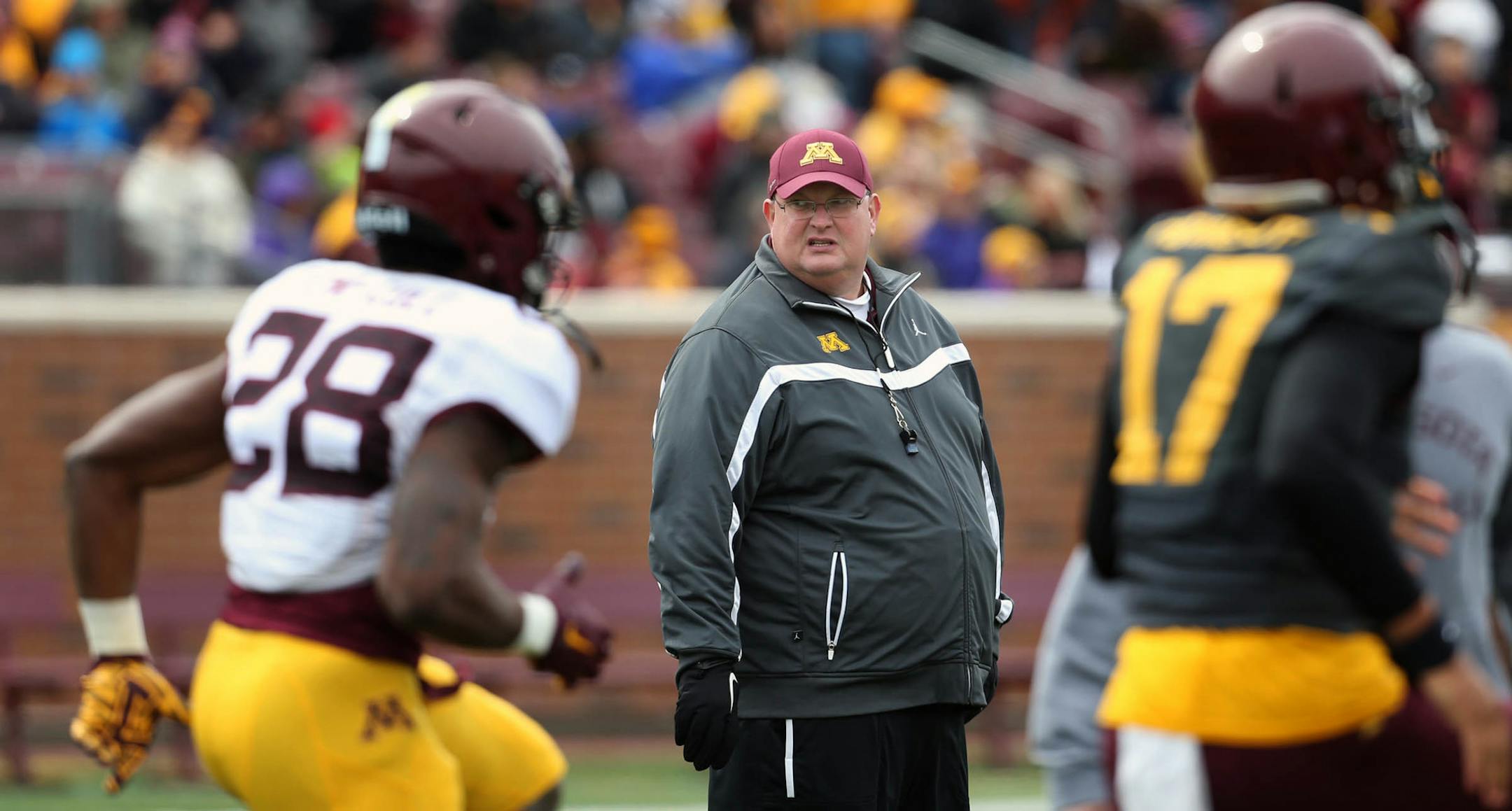 Head coach Tracy Claeys observed the game from behind the line of scrimmage.] JIM GEHRZ &#xef; james.gehrz@startribune.com / Minneapolis, MN / April 9, 2016 /12:30 PM &#xf1; BACKGROUND INFORMATION: Annual Gophers spring football game at TCF Bank Stadium. Gold won the game, 19-7.