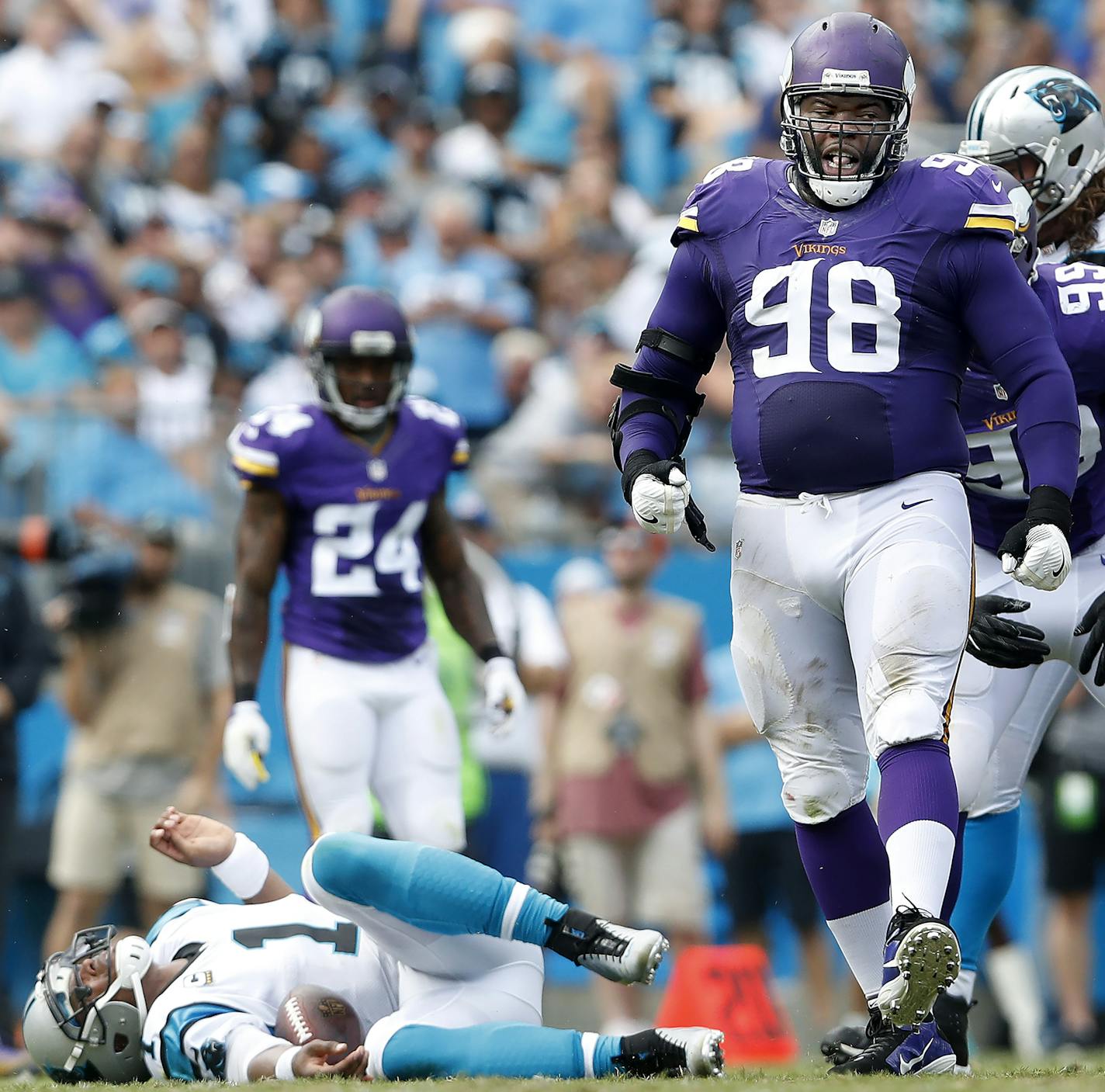 Linval Joseph (98) celebrated after sacking Cam Newton (1) in the second quarter.