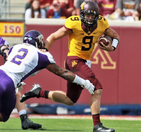 Minnesota Gophers vs. Western Illinois Leathernecks football. Gophers quarterback Philip Nelson pulled a hamstring on this option play in first half a