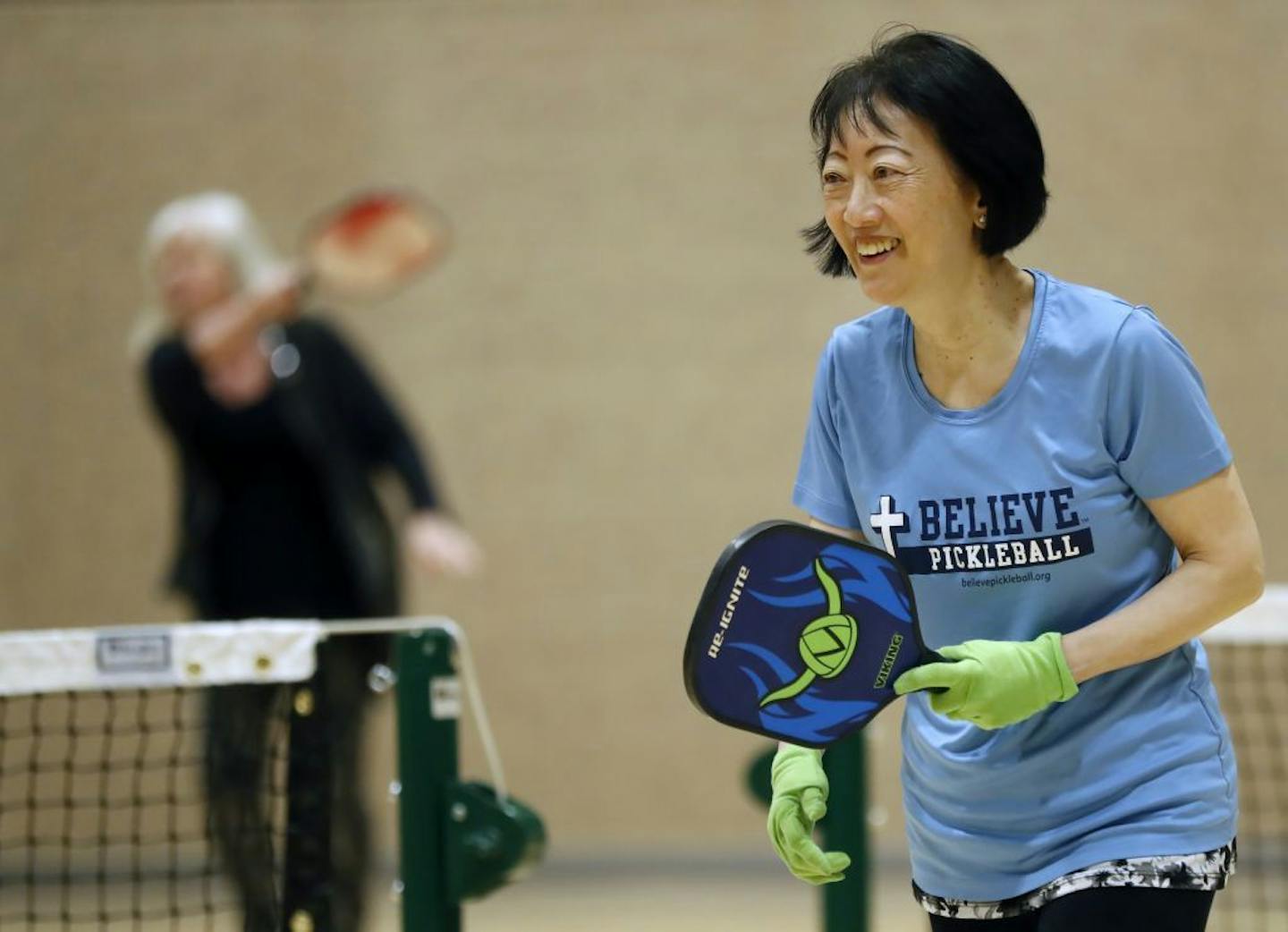 Mary Jane Yue, 67, is an avid player who says she is addicted to pickleball. The racket sport has long been popular among older adults and large groups have been clamoring for more indoor and outdoor courts in the suburbs.