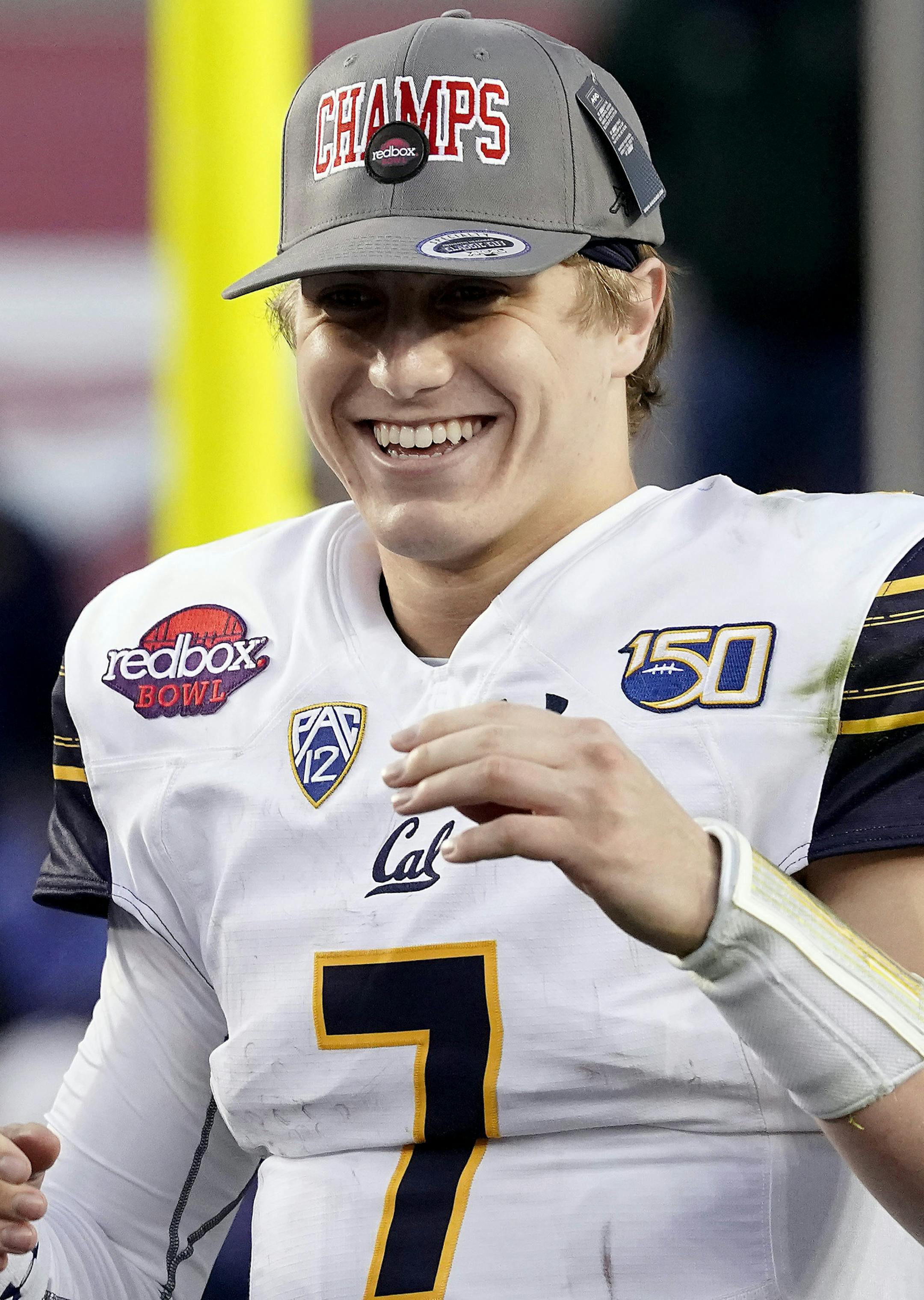 California quarterback Chase Garbers (7) smiles after being named offensive MVP of the Redbox Bowl NCAA college football game against Illinois, Monday, Dec. 30, 2019, in Santa Clara, Calif. (AP Photo/Tony Avelar)