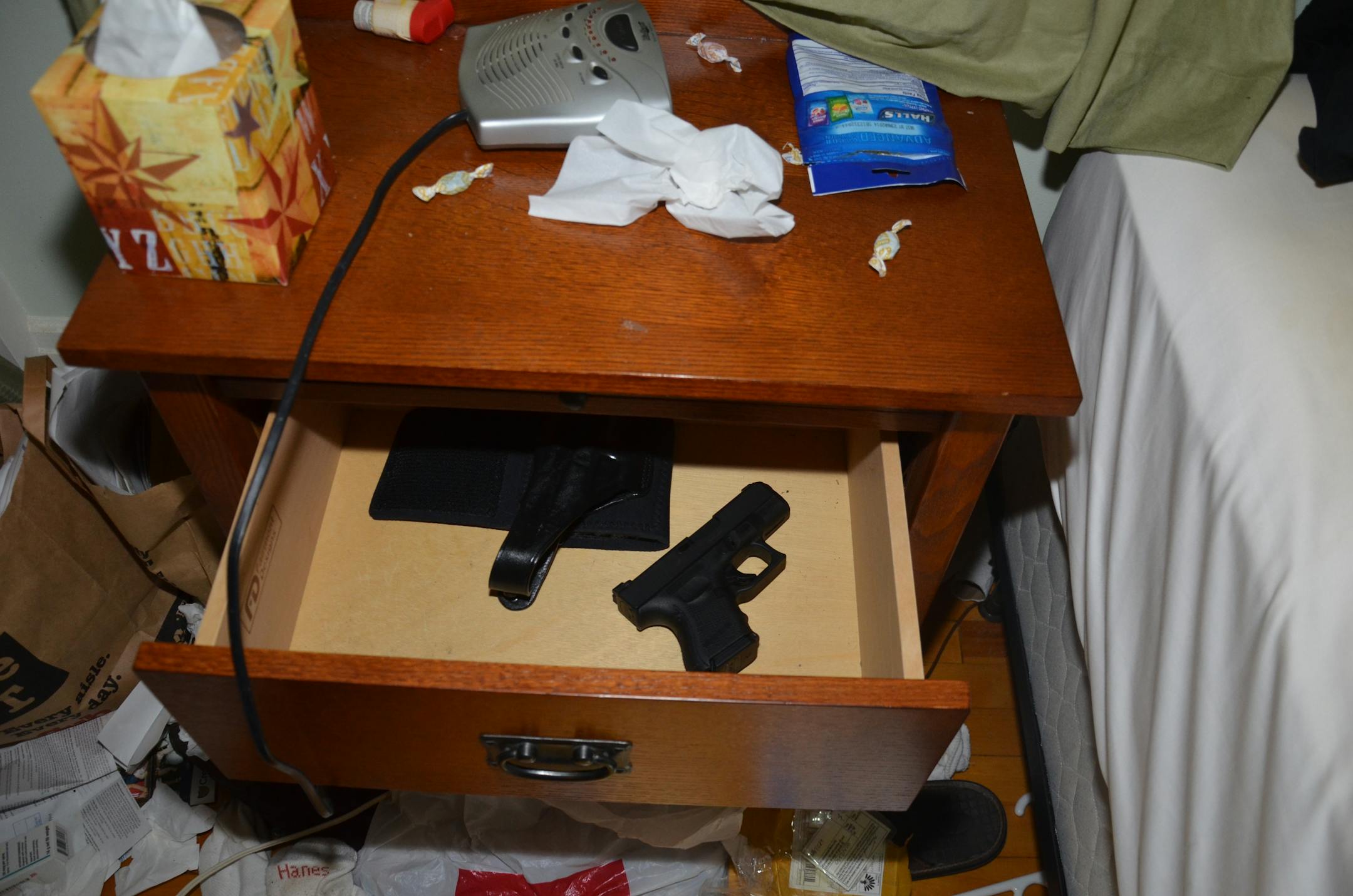 A gun was discovered in a nightstand in the bedroom of Andrew Engeldinger in Minneapolis.