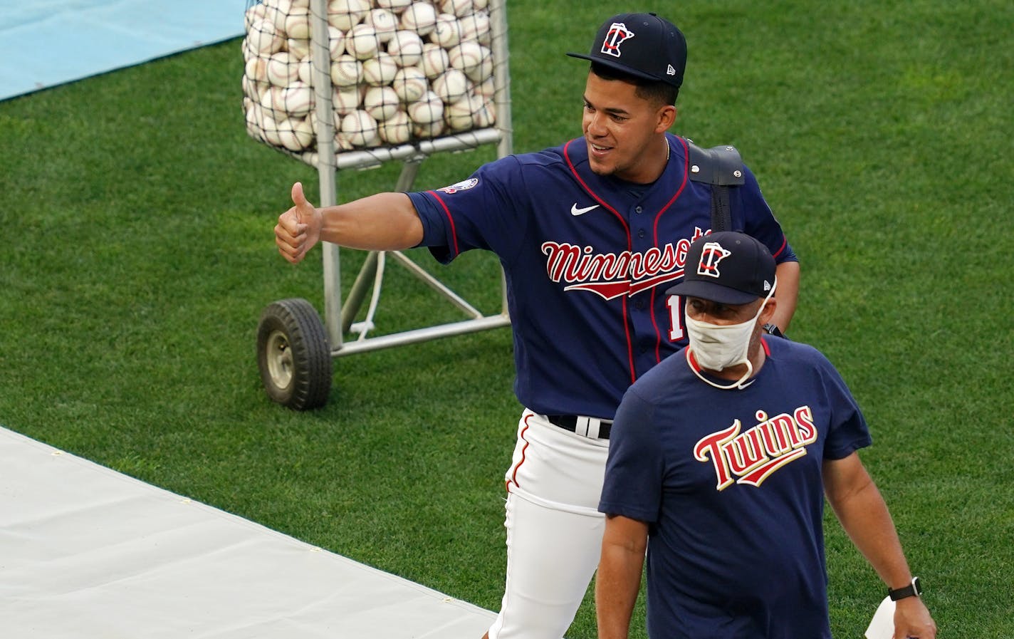 Minnesota Twins pitcher José Berríos (17) walked with pitching coach Wes Johnson (47) as he took the field during practice Friday. ] ANTHONY SOUFFLE • anthony.souffle@startribune.com The Twins practiced at Target Field for first time since spring training ended Friday, July 3, 2020 in Minneapolis. ORG XMIT: MIN2007031918030542