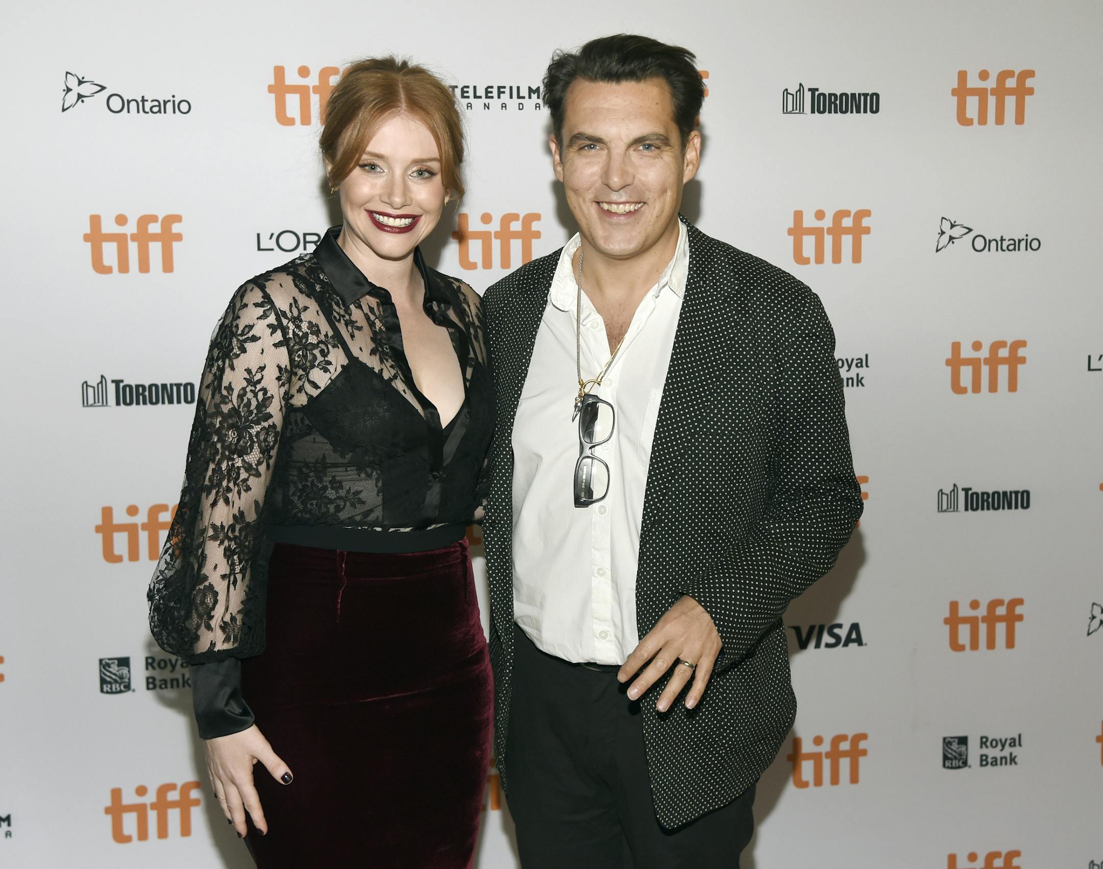 Bryce Dallas Howard, left, a cast member in the "Black Mirror" episode "Nosedive," poses with director Joseph Wright at the premiere of the new season of the television series on day 5 of the Toronto International Film Festival at Ryerson Theatre on Monday, Sept. 12, 2016, in Toronto. (Photo by Chris Pizzello/Invision/AP)