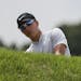 Cameron Champ hits to the sixth green during the third round of the U.S. Open golf tournament Saturday, June 17, 2017, at Erin Hills in Erin, Wis. (AP