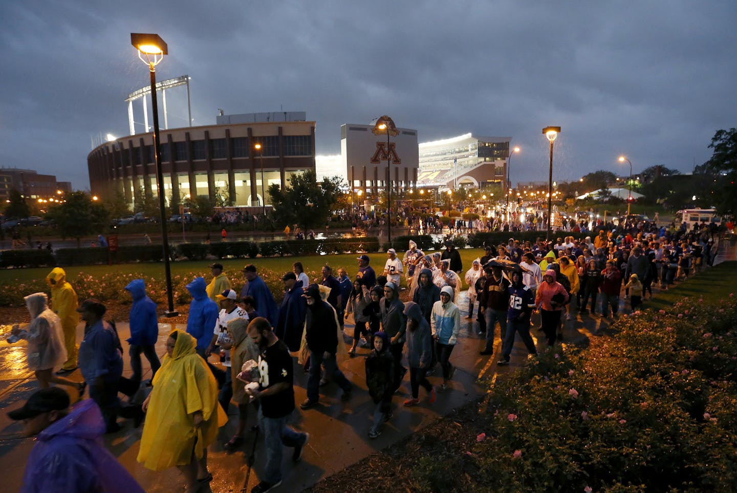 Fans evacuated the TCF Banks Stadium and headed to Mariucci and Williams Arenas in the second quarter after an announcement was made on the PA due to inclement weather.