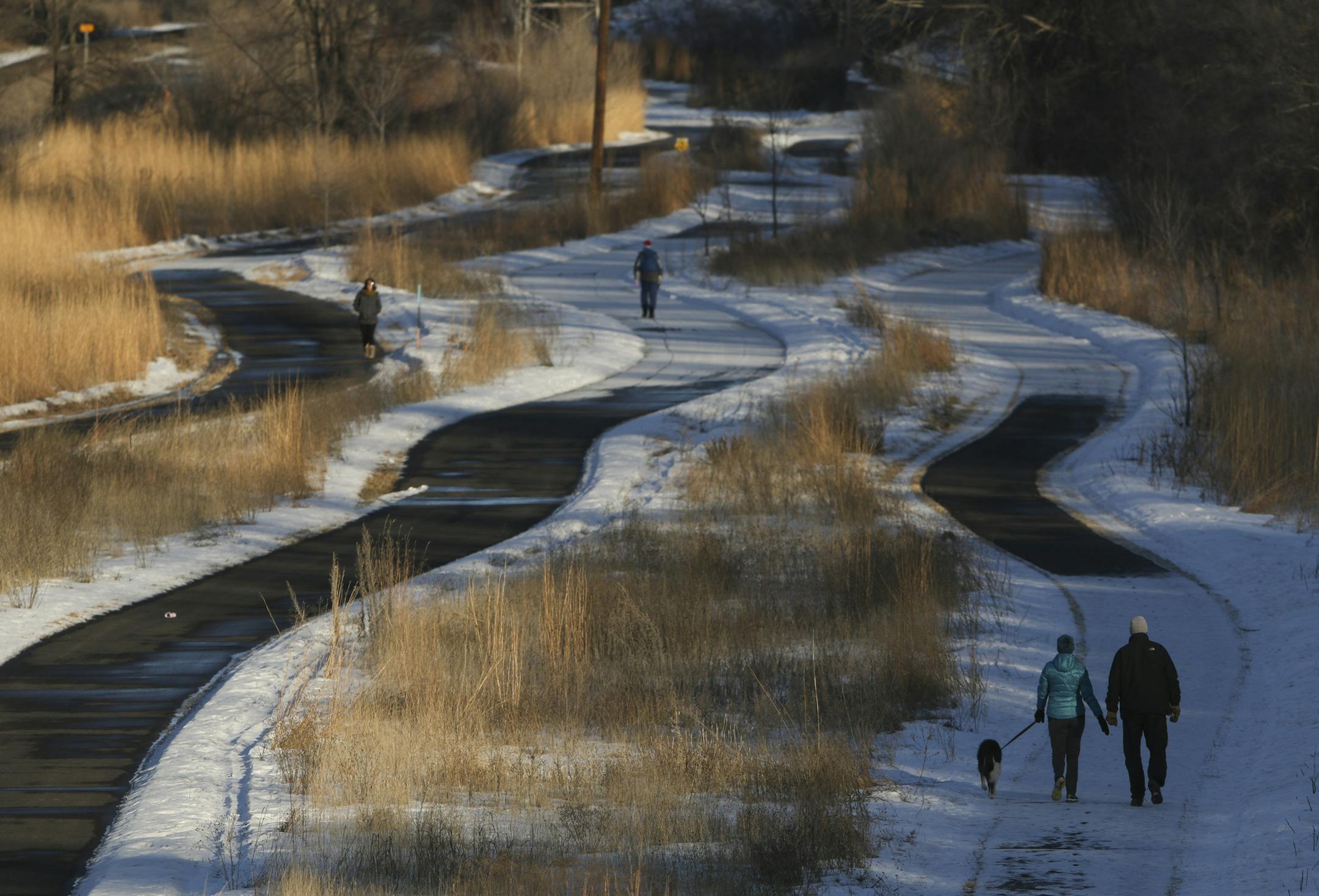 Users walked on the Cedar Lake Regional Trail in St. Louis Park Sunday afternoon. ] JEFF WHEELER &#x201a;&#xc4;&#xa2; jeff.wheeler@startribune.com After two decades of rapid paved trail expansion, officials are questioning whether enough planning and money has gone into preserving and connecting the sometimes disparate pathways. Trails have a lifespan of 15 to 20 years before erosion, cracks and potholes require them to be rebuilt. As some metro-area trails start to reach the end of their life,