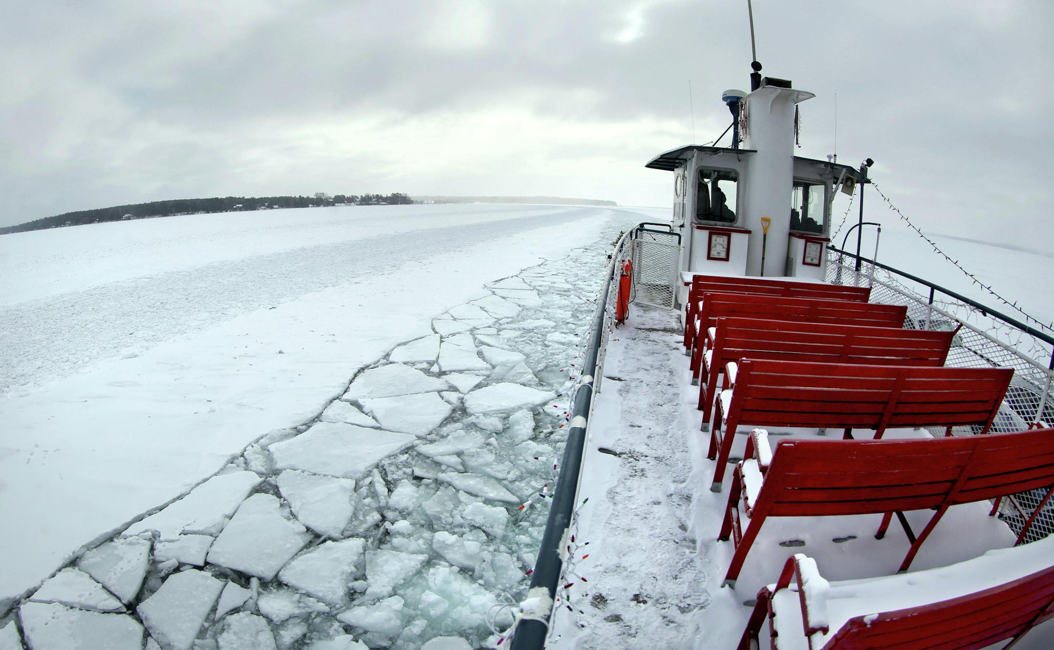 t1.5.18 Bob King -- 010618.N.DNT.FERRYc7 -- With the temperature at zero and headwinds, few passengers ventured aboard the top deck to take in the view on the Nichevo II as it headed back to Bayfield after picking up passengers at Madeline Island Friday. Bob King / rking@duluthnews.com
