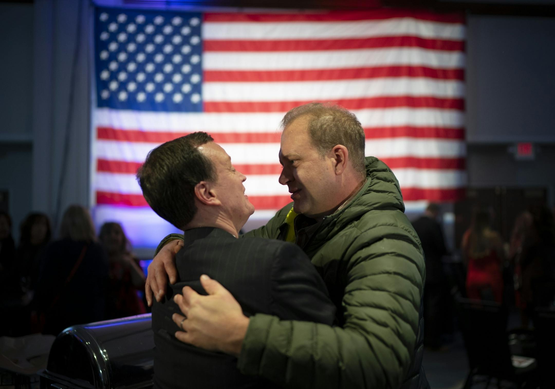 Republican gubernatorial candidate Jeff Johnson was engulfed in a hug by Lance Juffer of Hutchinson as he worked his way around the ballroom with his running mate, Donna Bergstrom early Tuesday night.
