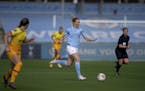 Manchester City's Sam Mewis, center, in action in the Women's Super League soccer match between Manchester City Women and Tottenham Hotspur Women at t