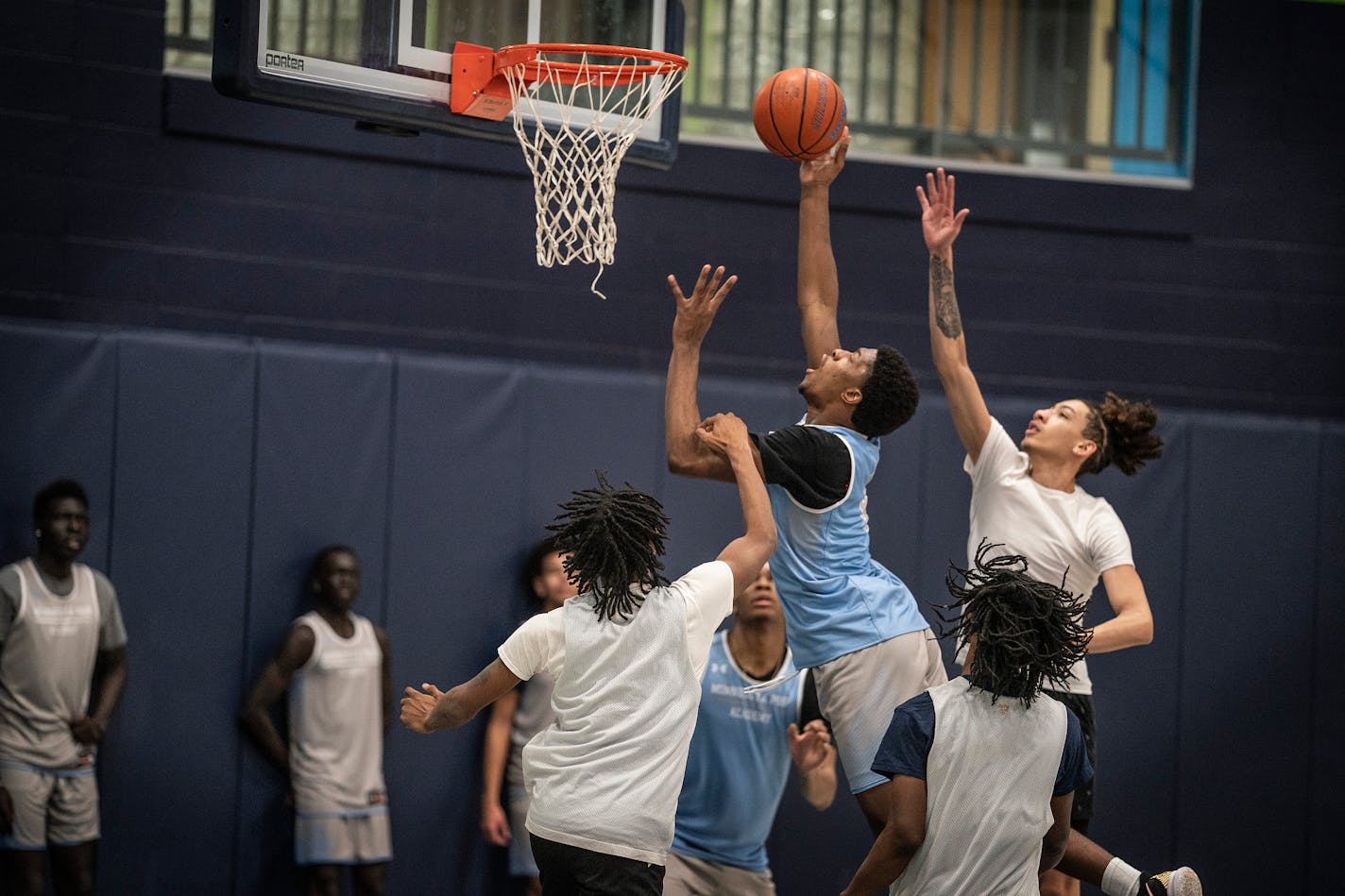 DJ Jefferson drives to the basket during practice, in Minneapolis, Minn., on Tuesday, Jan. 25, 2022.