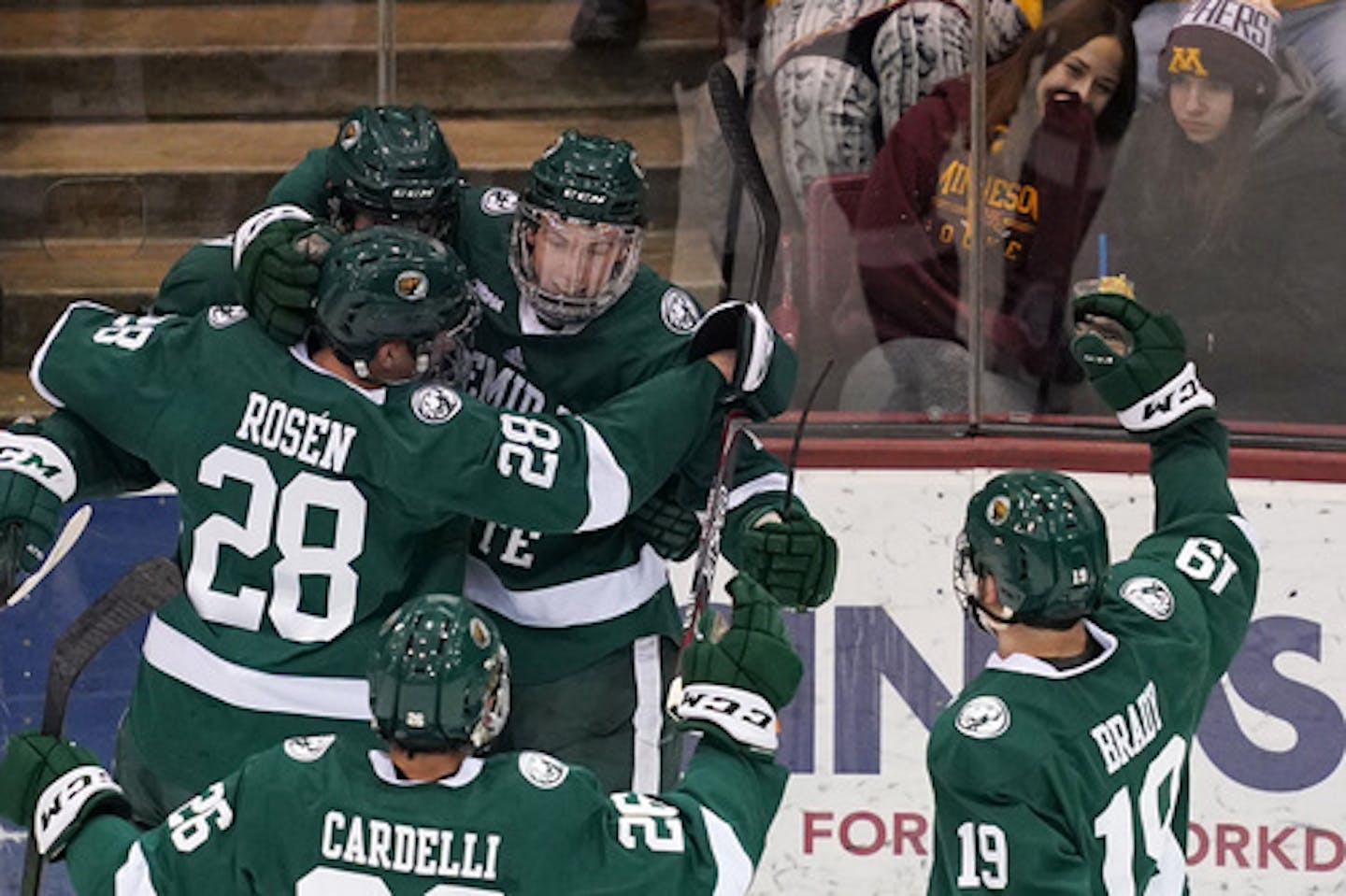 Beavers forward Ross Armour (17) was mobbed by his teammates after scoring on Gophers goaltender Jack LaFontaine (45) in the first period. ] ANTHONY SOUFFLE • anthony.souffle@startribune.com