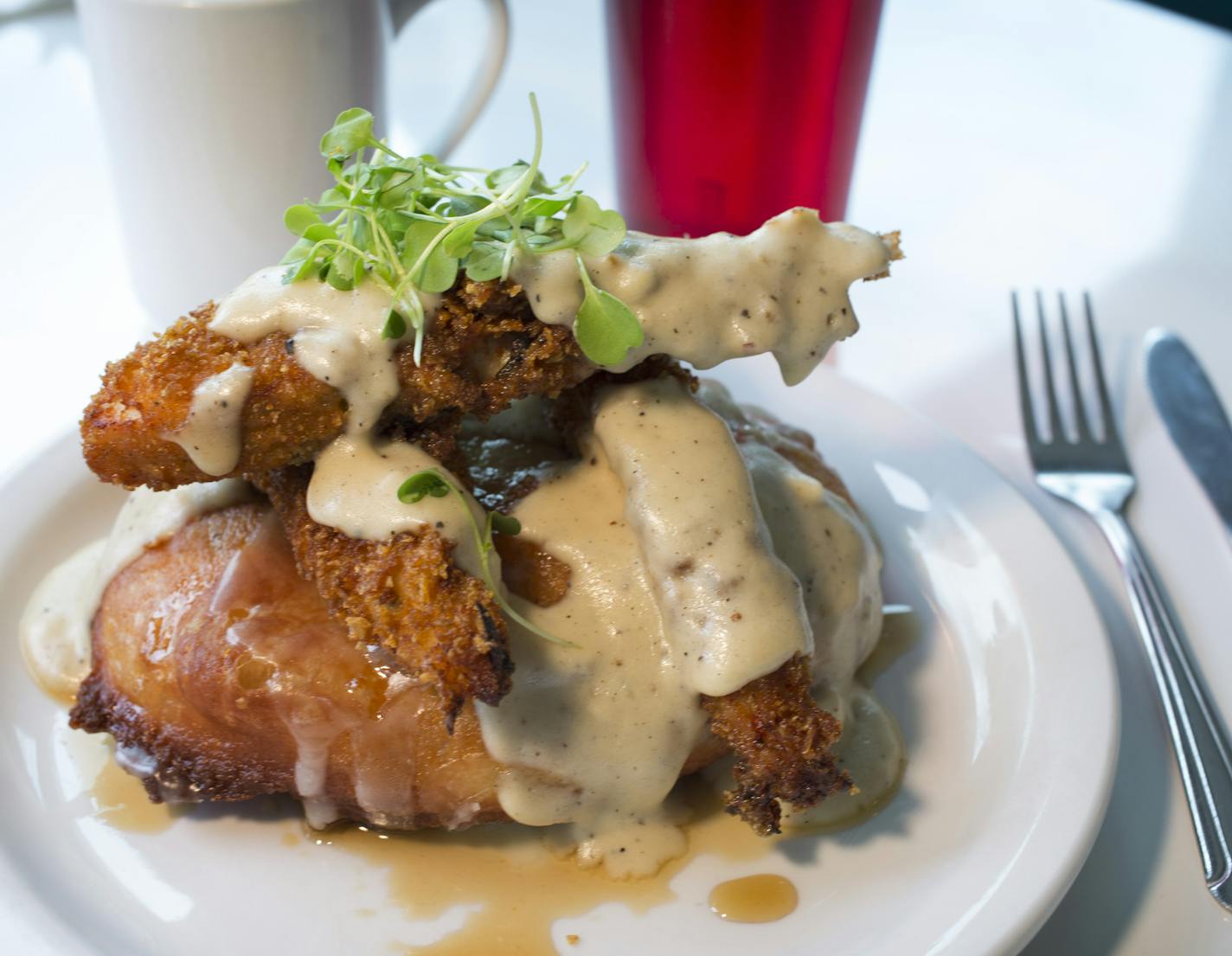 Gary Coop-er, fried chicken and gravy stacked on a doughnut.