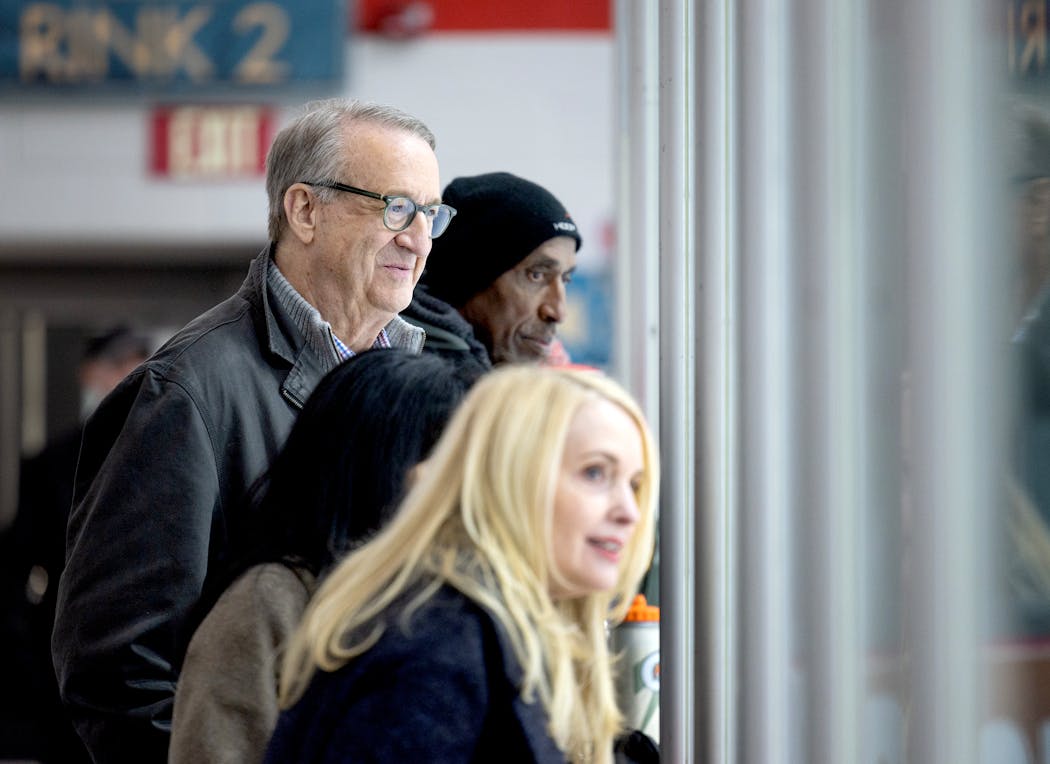 Karin Nelsen, Malina Anderson, Mark Rosen and former NBA player Trent Tucker watched a hockey game at Eden Prairie Ice Arena. Anderson and Tucker’s son plays for Eden Prairie. 