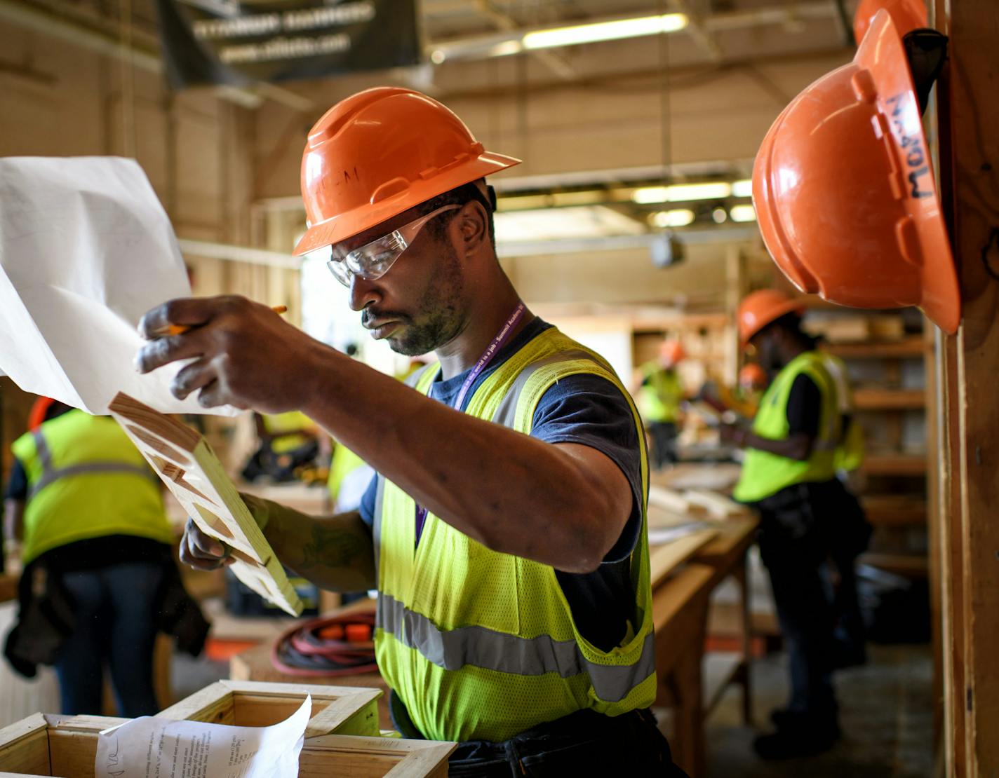 Tamir Raheem is in a carpentry training program at Summit Academy in Minneapolis. The program is free of charge, paid for by government and foundation dollars.