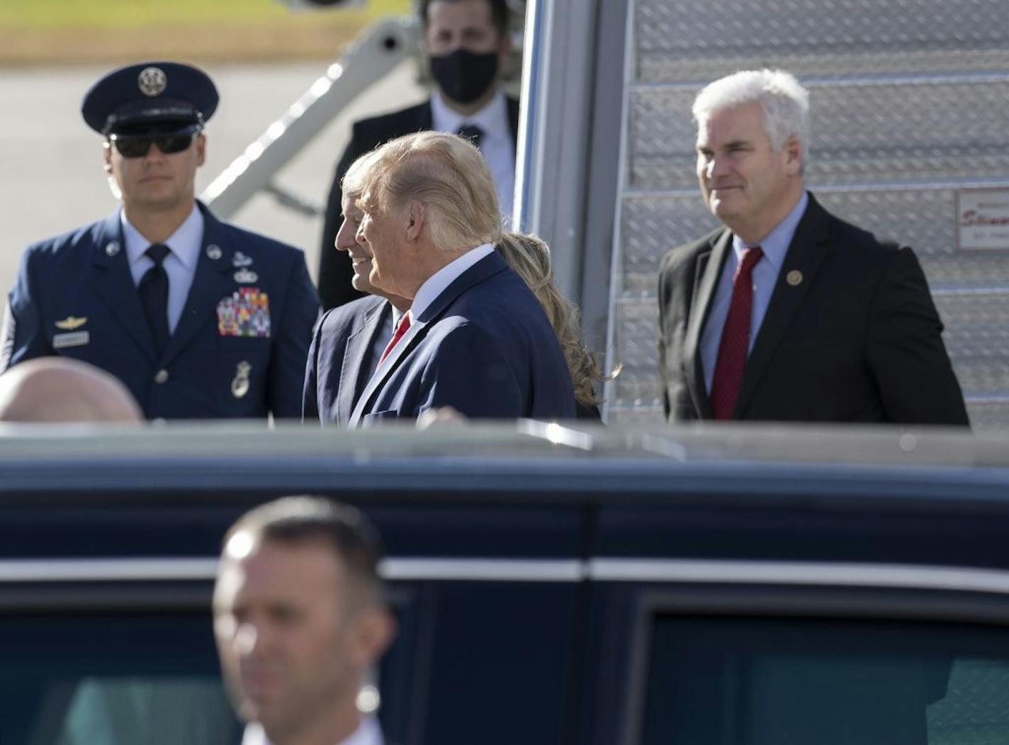 Supporters including U.S. Representative Tom Emmer, right, meet President Donald Trump as he arrived at MSP airport Wednesday September 30. Standing next to the president is Republican Senate Majority Leader Paul Gazelka and his wife Maralee. President Donald Trump arrived at MSP airport Wednesday September 30,2020 in Minneapolis,MN.