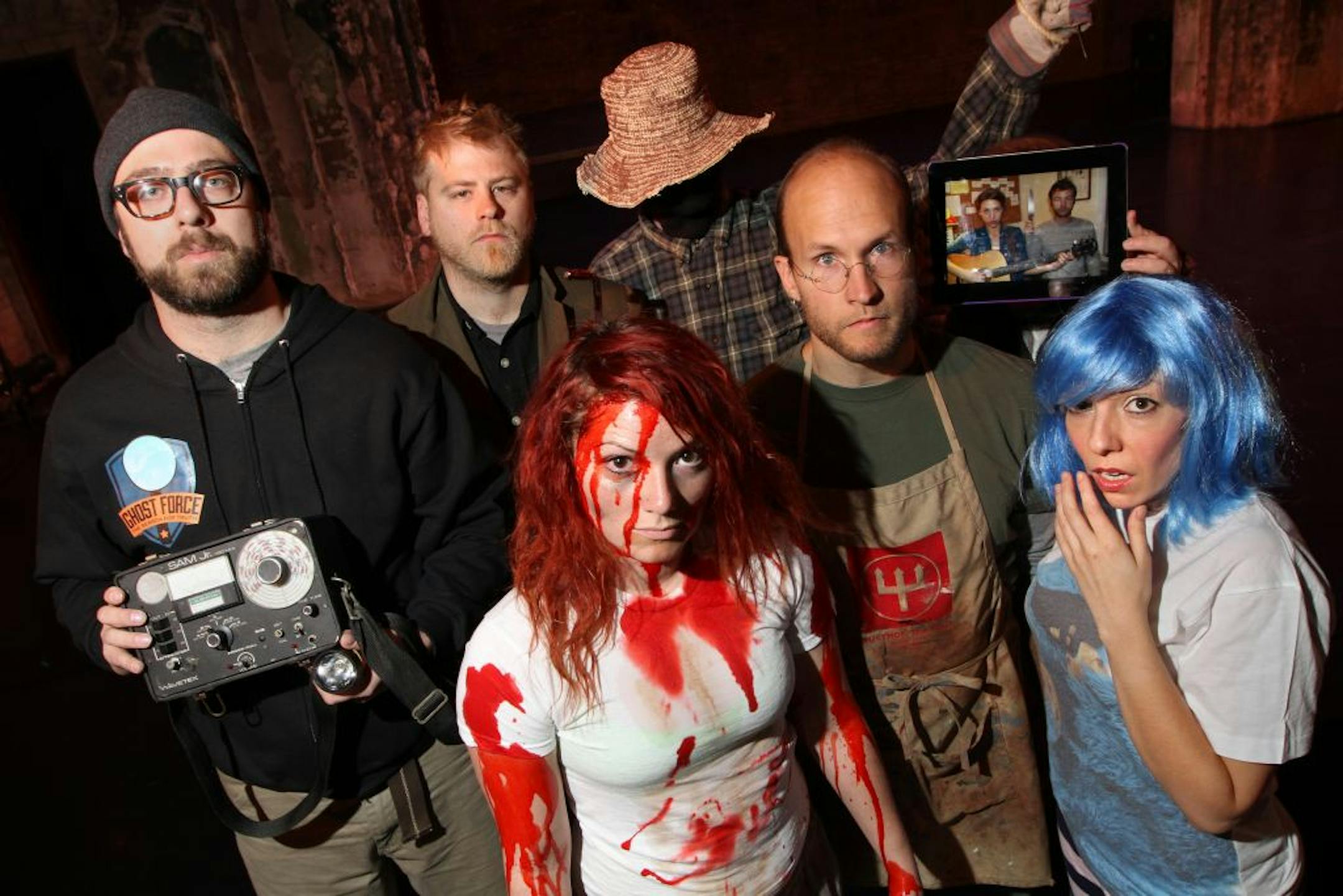 Mike Fotis, Chris Hepola,blood-drenched Laura Mahler, Ryan Lear (in hat), Tyler Olson, Katie Hartman and Nick Ryan (via video) and Erin Sheppard from the Twin Cities Horror Festival.
