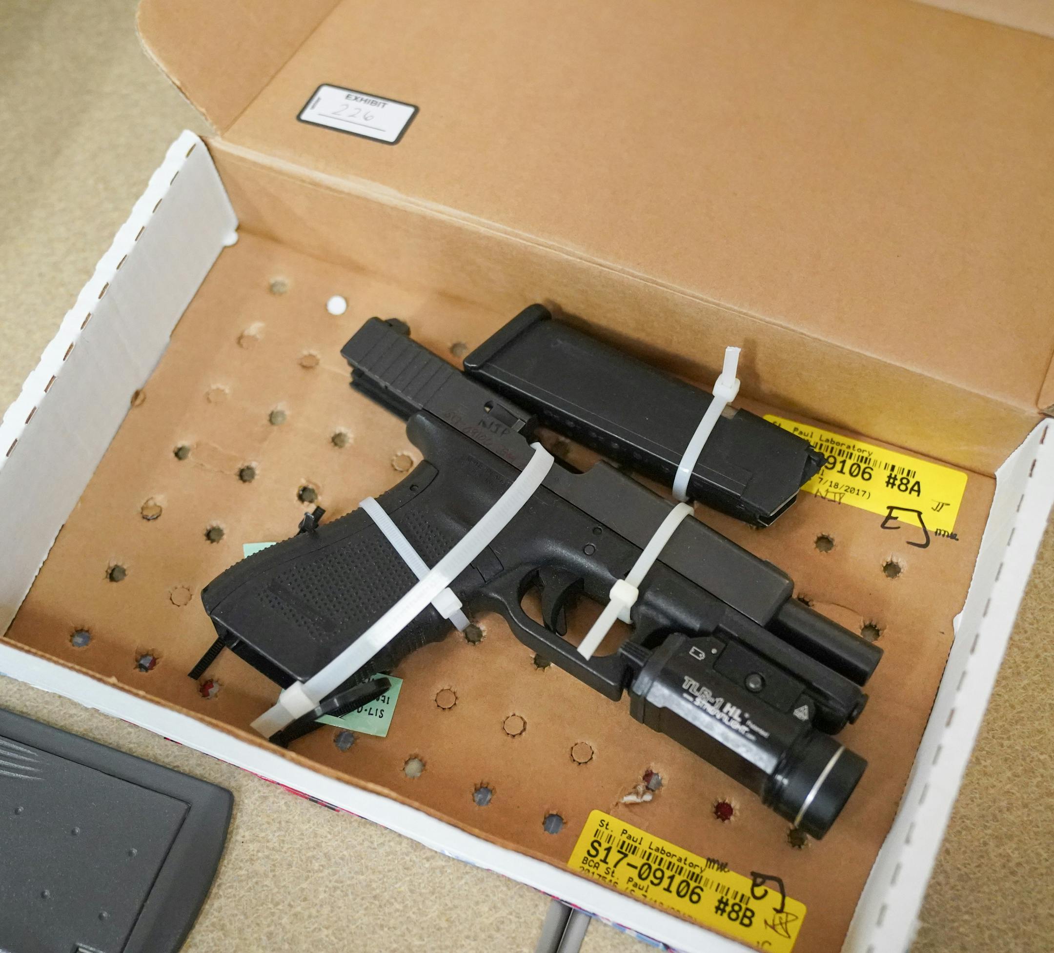 Officer Noor's weapon, a 9mm glock. ] GLEN STUBBE • glen.stubbe@startribune.com Friday, May 24, 2019 Evidence presented in the trial of former Minneapolis police officer Mohamed Noor was made available for public viewing Friday.