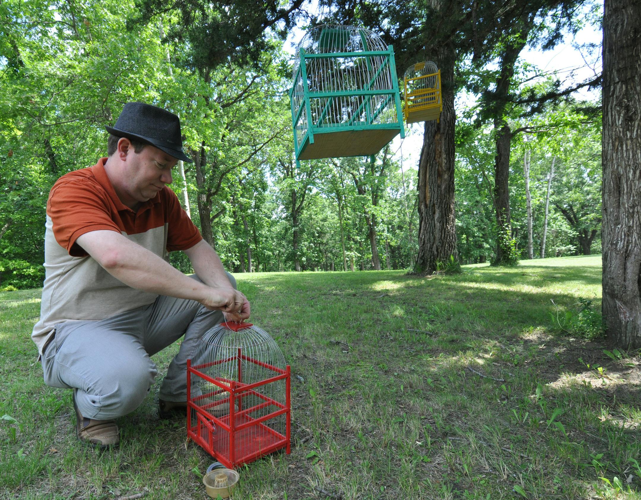 Photo by Liz Rolfsmeier California composer Hugh Livingston preps his "hypothetical birds" for his upcoming sound installation/performance at Caponi Art Park.