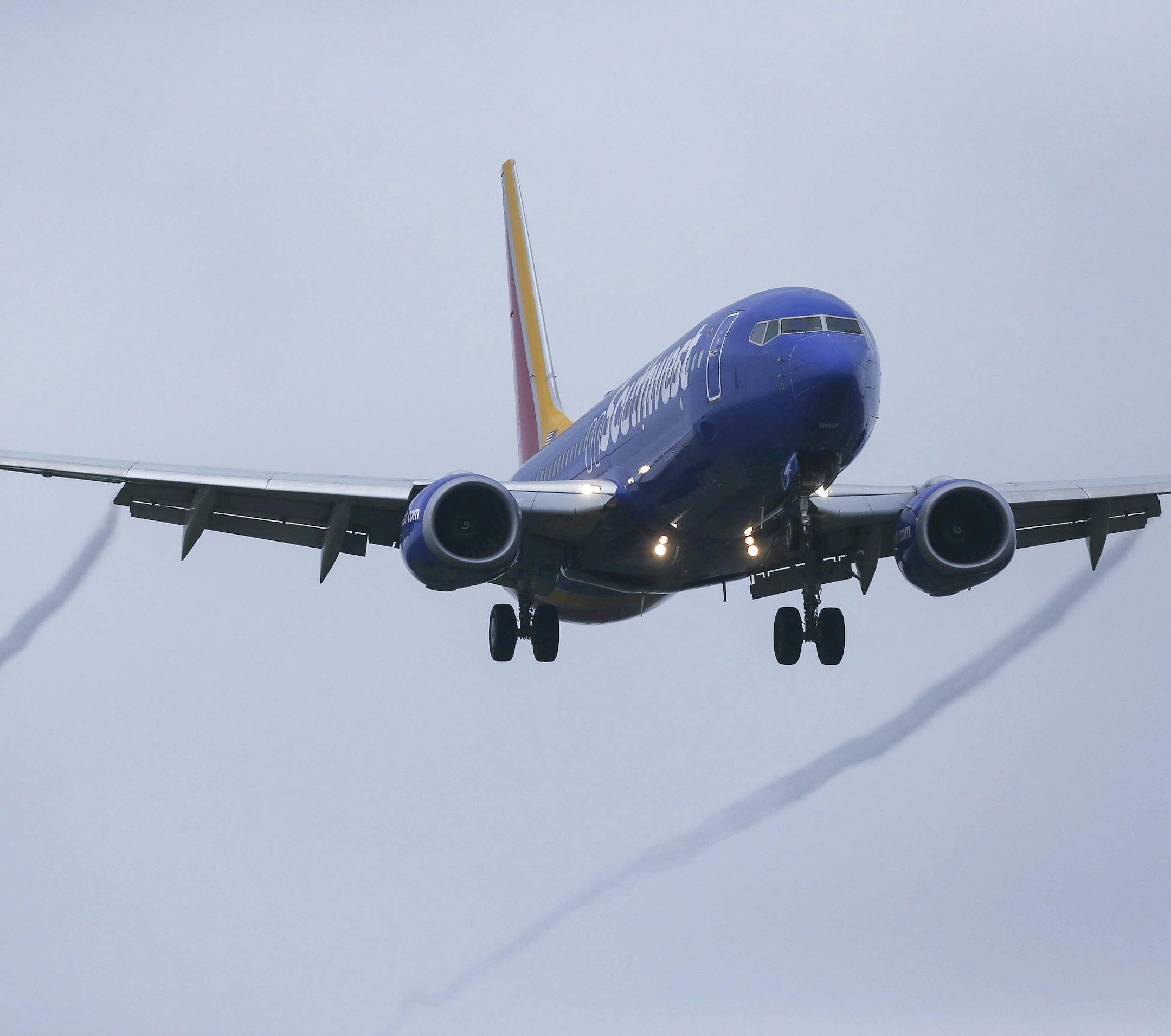 A Boeing 737 MAX 8 operated by Southwest Airlines arrives for a landing at Hobby Airport, Wednesday, March 13, 2019, in Houston. President Donald Trump issued an emergency order Wednesday grounding all Boeing 737 Max 8 aircraft in the wake of a crash of an Ethiopian airliner, a reversal for the U.S. after federal aviation regulators had maintained it had no data to show the jets are unsafe. (Yi-Chin Lee/Houston Chronicle via AP)