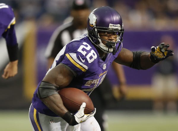 Vikings running back Adrian Peterson ran for 19 yards on 4th and 1 in the fourth quarter. Quarterback Matt Cassel watched as Peterson passed 10,000 ru