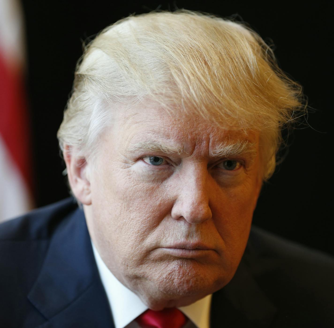 Republican Presidential candidate Donald Trump listens to a question during an interview after a rally in Virginia Beach, Va., Monday, July 11, 2016. (AP Photo/Steve Helber)