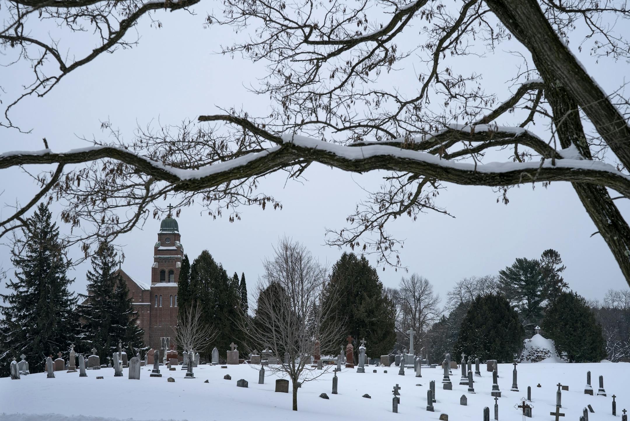 Members of the congregation at Sacred Heart Church gathered for mass and a memorial service for Brother James Miller, a Wisconsin native murdered in Guatemala in 1982.