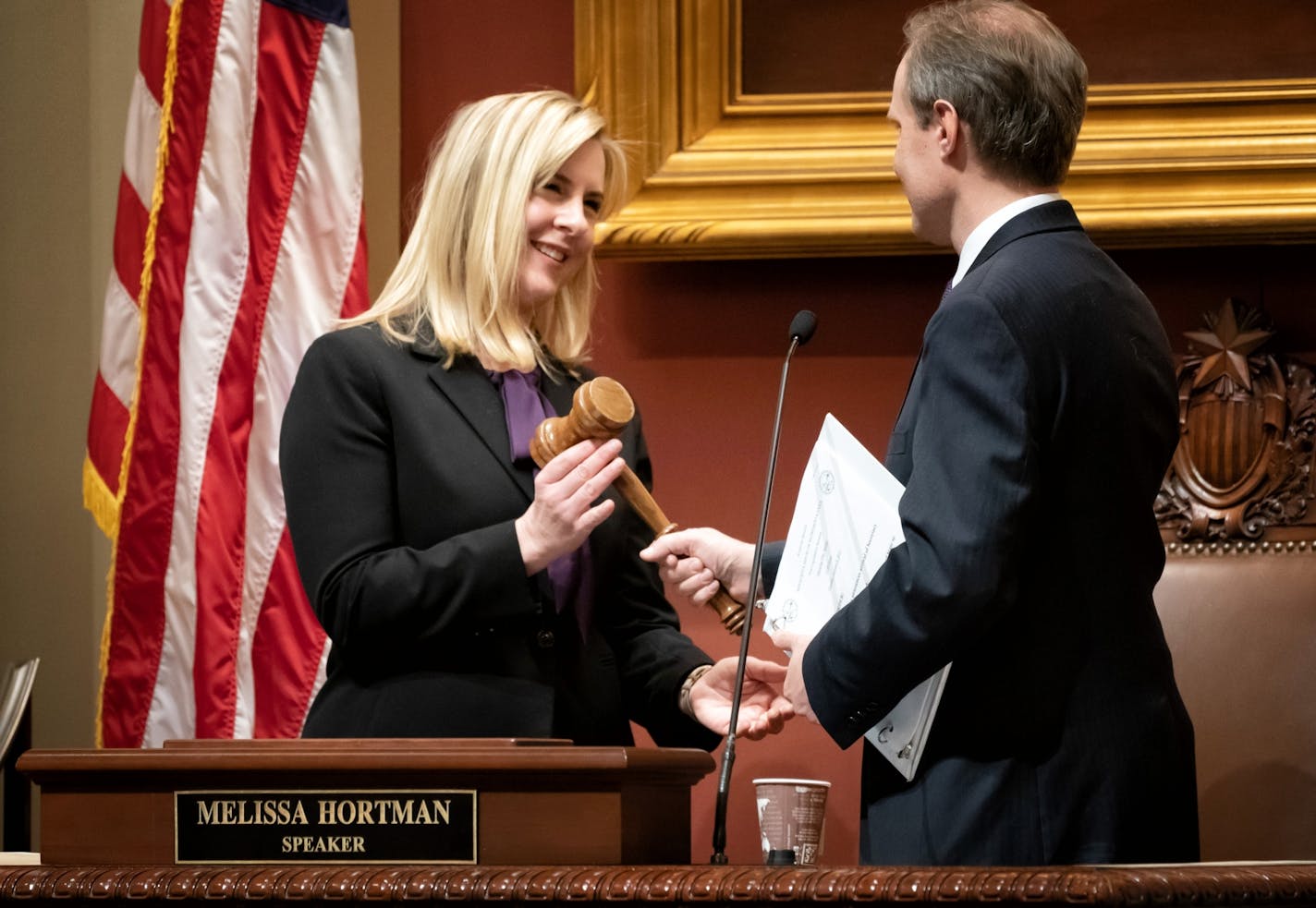 Melissa Hortman accepted the speaker's gavel from Secretary of State Steve Simon after she was sworn in as House Speaker.