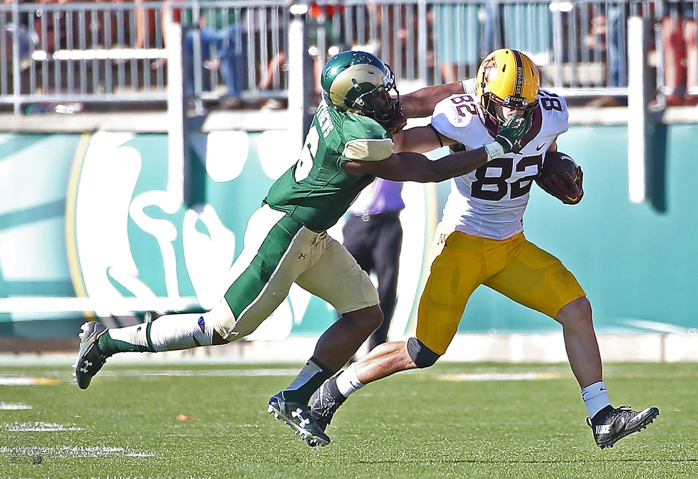 Minnesota wide receiver Drew Wolitarsky is face masked by Colorado State safety Trent Matthews in the fourth quarter as Minnesota took on Colorado State at Sonny Lubick Field at Hughes Stadium, Saturday, September 12, 2015 in Ft. Collins, CO. ] (ELIZABETH FLORES/STAR TRIBUNE) ELIZABETH FLORES &#x2022; eflores@startribune.com