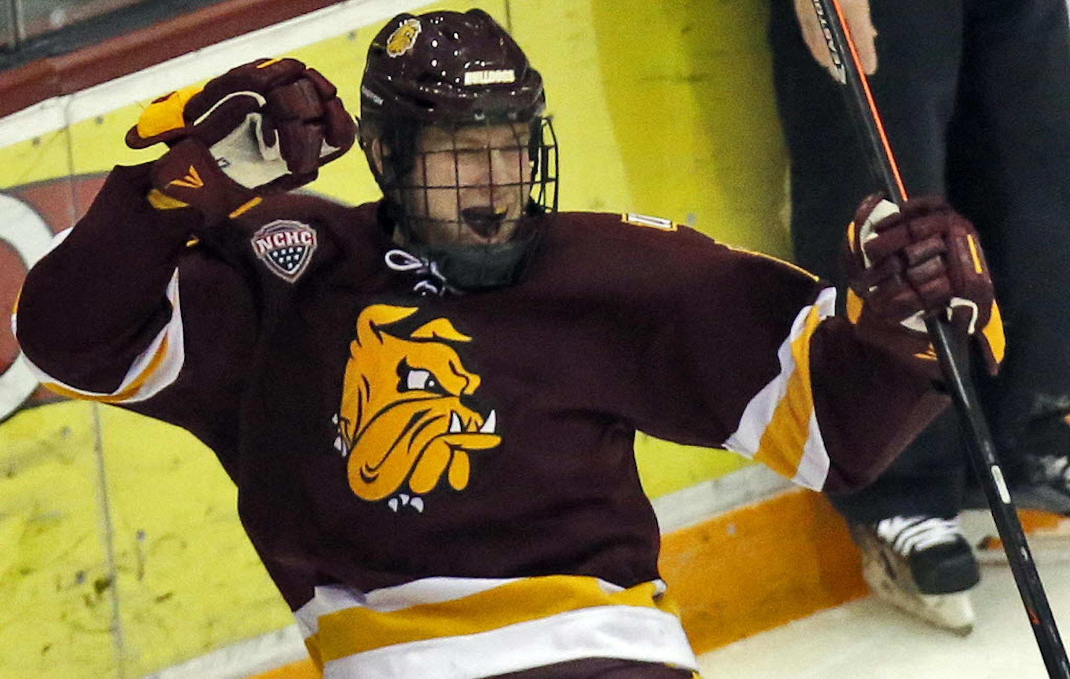 UMD's Dominic Toninato celebrated after scoring a first-period goal.