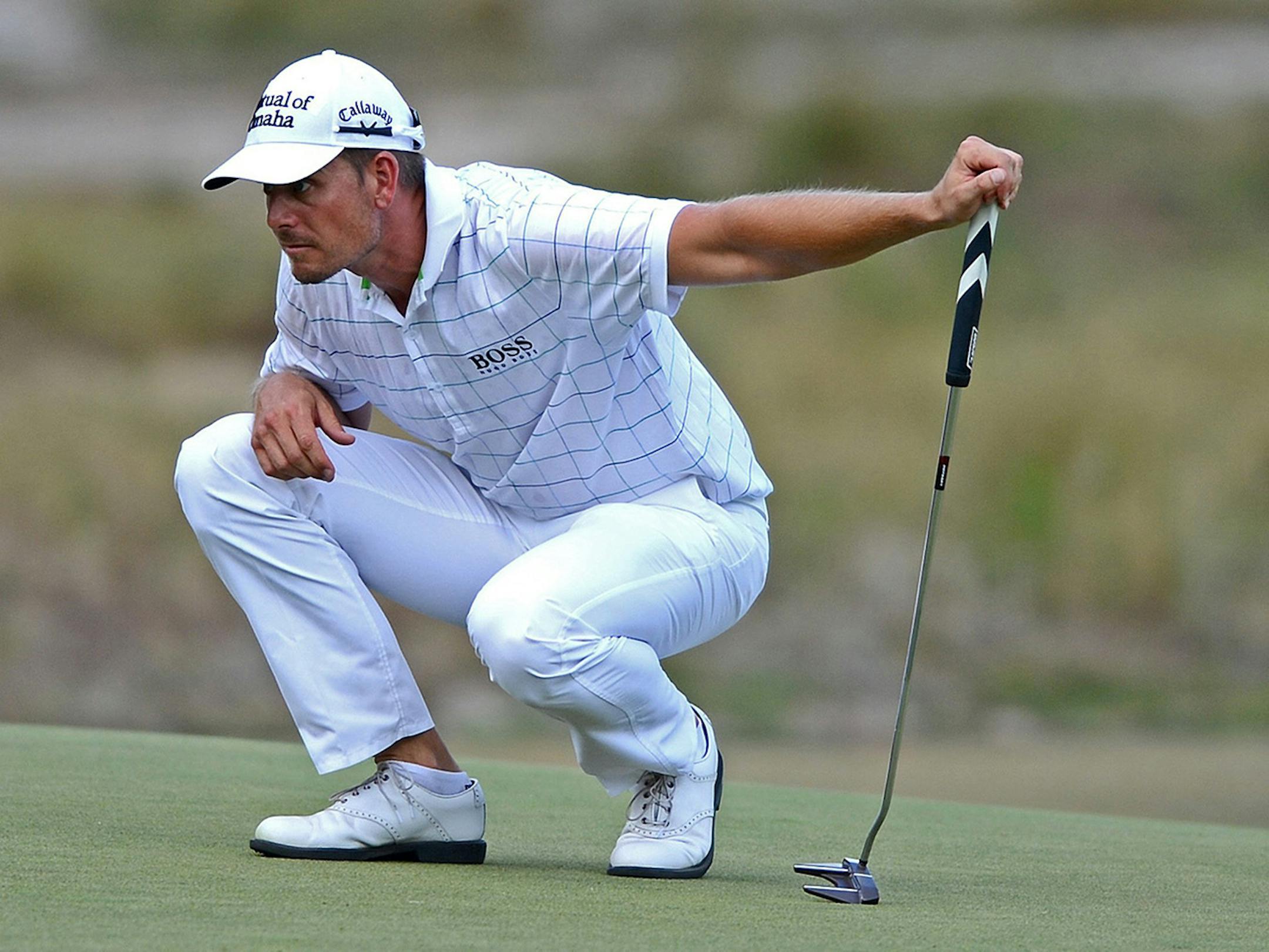 Henrik Stenson lines up a putt on the seventh green during third-round action at the 2014 U.S. Open at Pinehurst 2 in Pinehurst, N.C., Saturday, June 14, 2014.