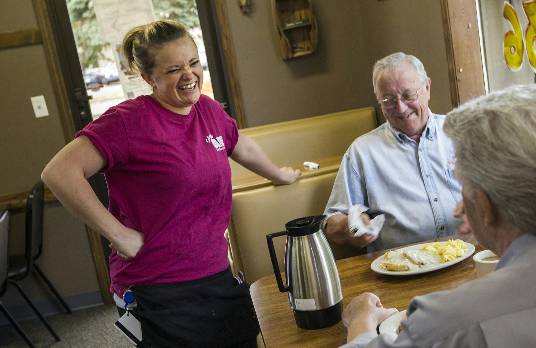 Savannah Weiden visits with customers at her aunt's restaurant, Shar'els Caf&#x221a;&#xa9; in Oakdale, July 18, 2014. (Courtney Perry/Special to the Star Tribune)