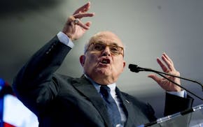 FILE - In this May 5, 2018, file photo, Rudy Giuliani, an attorney for President Donald Trump, speaks in Washington. Giuliani says he'd only cooperate