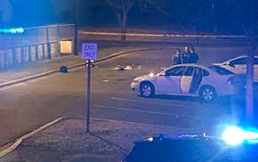 A crime scene at Sanborn Park in Robbinsdale where two people were shot on May 4, 2025.