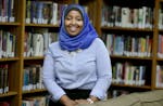 Munira Khalif stood in the Mounds Park Academy Library, Thursday, October 23, 2014 in St. Paul, MN. Khalif, a 17-year-old senior, founded a nonprofit 
