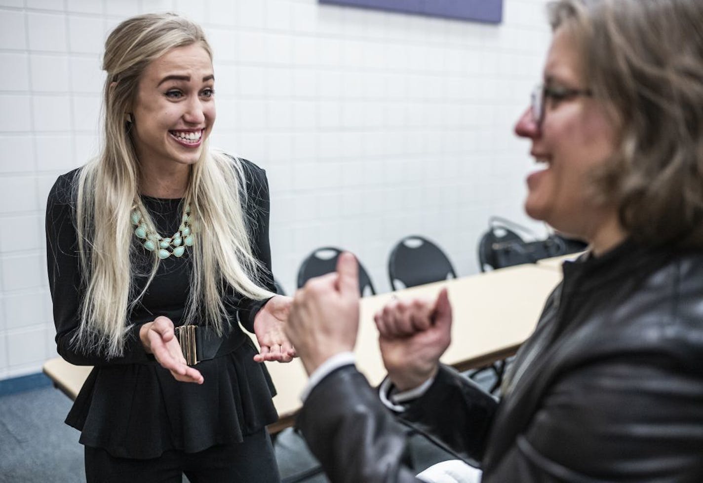 Megan Olson, a 20-year-old Republican, wants to unseat DFL Rep. Robert Bierman in Apple Valley. She chats up Erika Cashin who is looking to challenge the 2nd District's Democratic U.S. Representative Angie Craig.